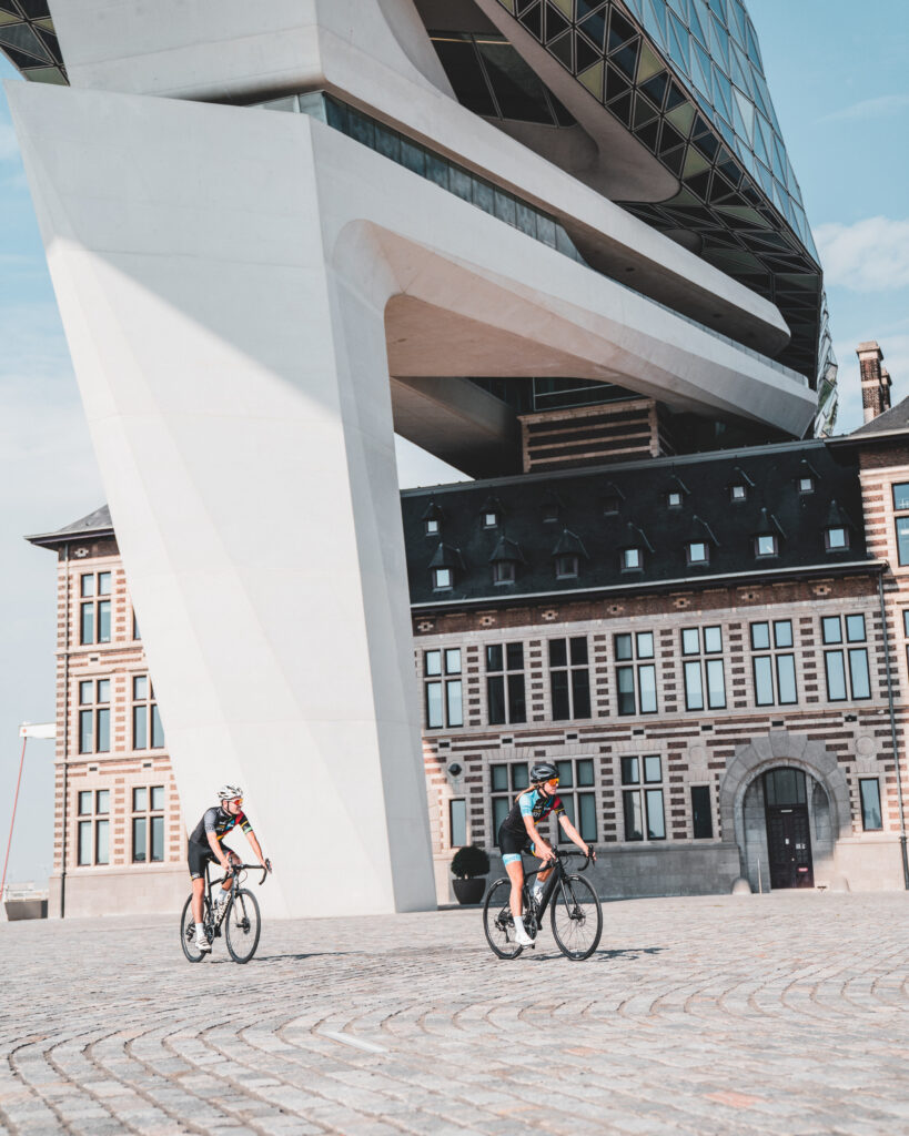 Cyclists cycling in a Flemish, Belgian design city