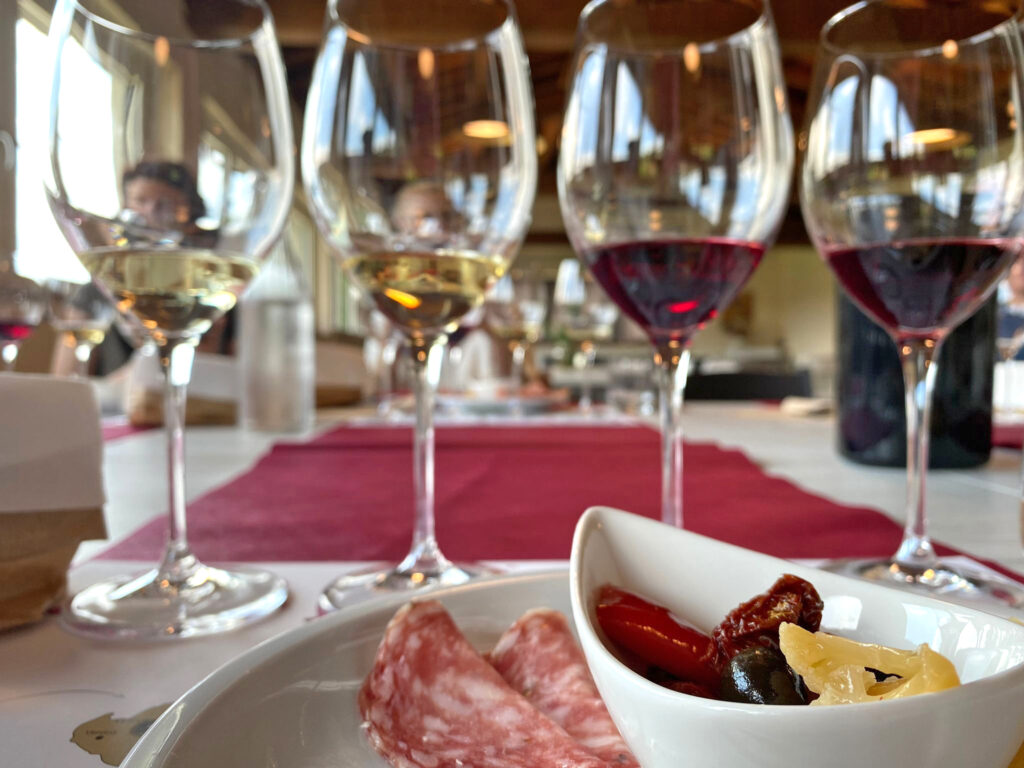 Wine tasting in Salento with Negroamaro and a plate of local salami antipasti